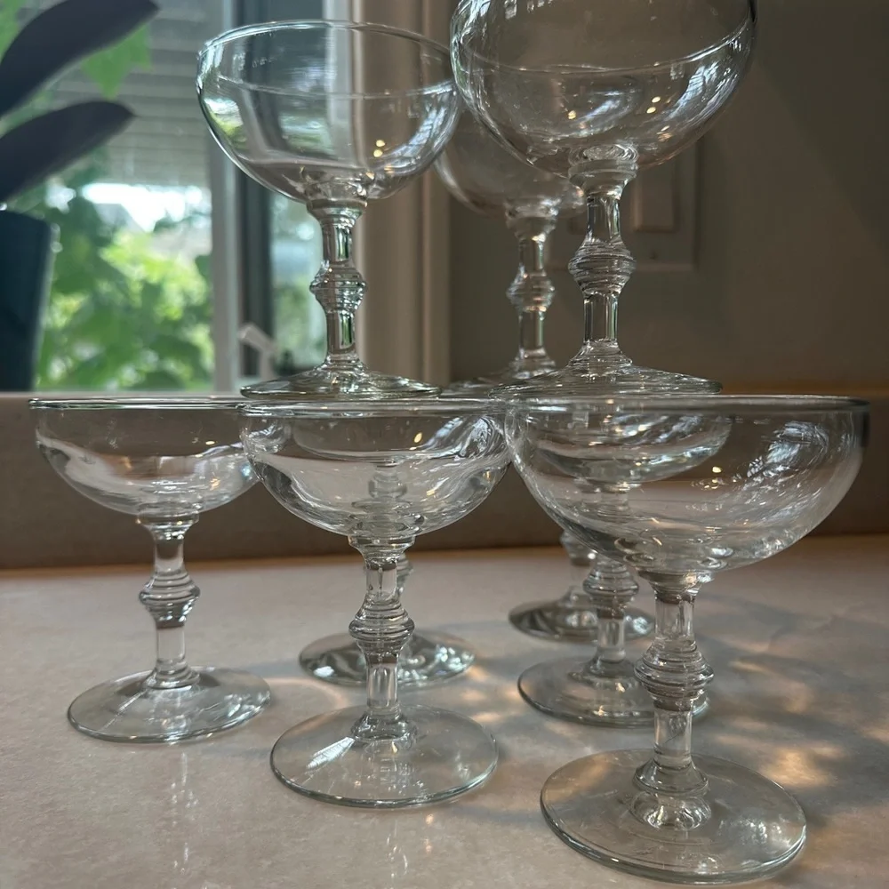 Set of 9 vintage champagne glasses.